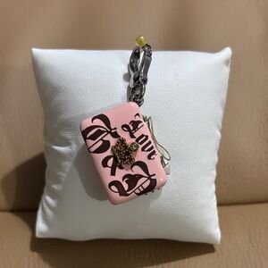 Juicy Couture Laptop that opens to a screen and keyboard